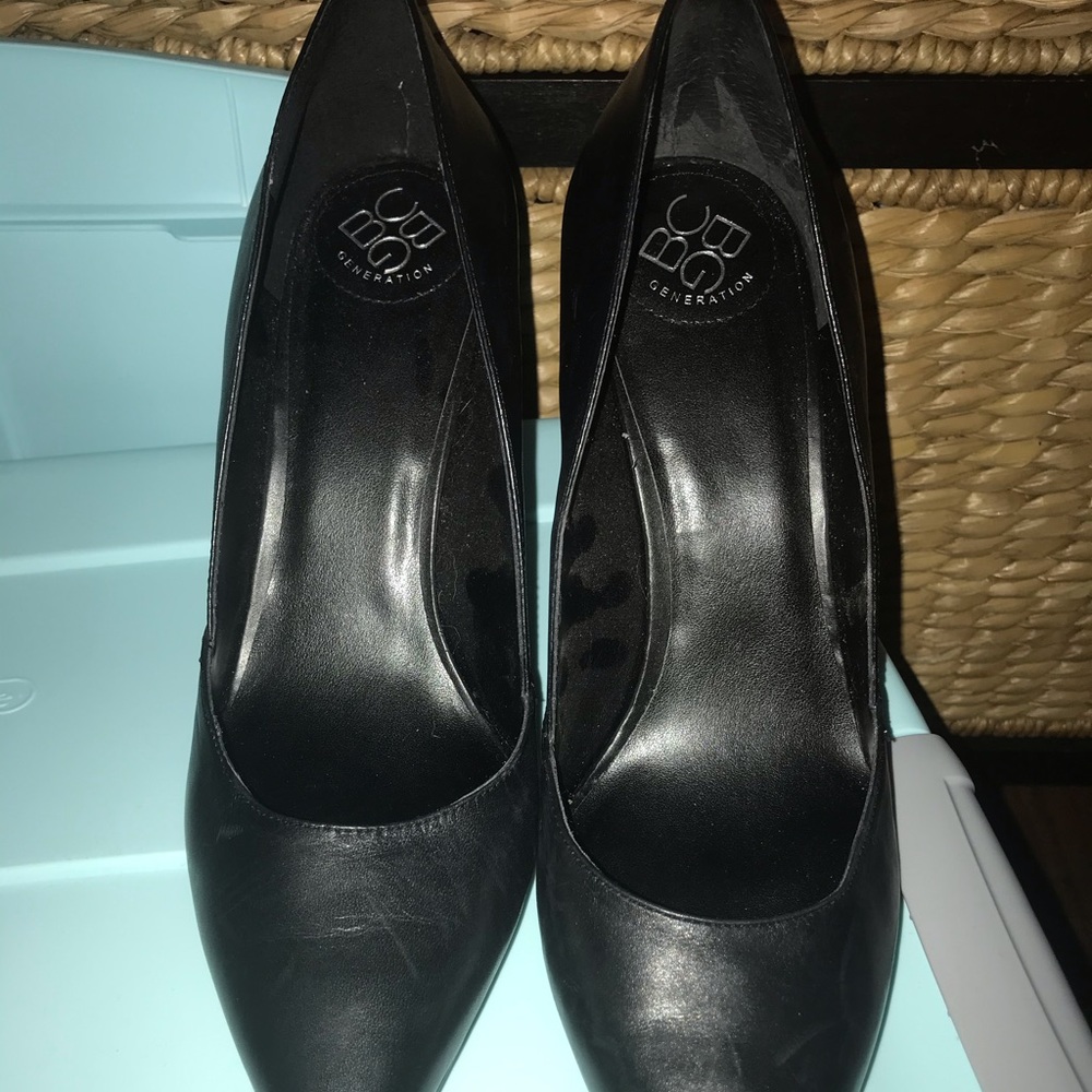 Black BCBG Generation heels with cross detail